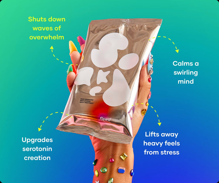 Sads Smashing pouch in a hand with jeweled nails, part of the Flewd Nootropic Trio